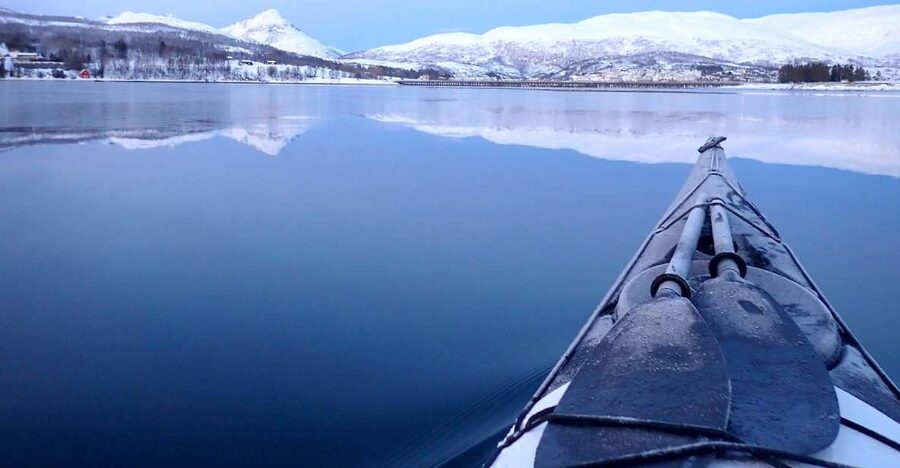 Tromsø: Winter Sea Kayaking Tour with Wildlife Sightings - The return to basecamp and fire