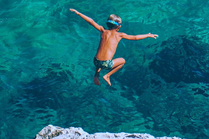 Uncharted Marine Reserve Cave, Snorkel & Cliff Jumping Kayak Tour - A sea cave, clear water, and cliff jumps in one outing