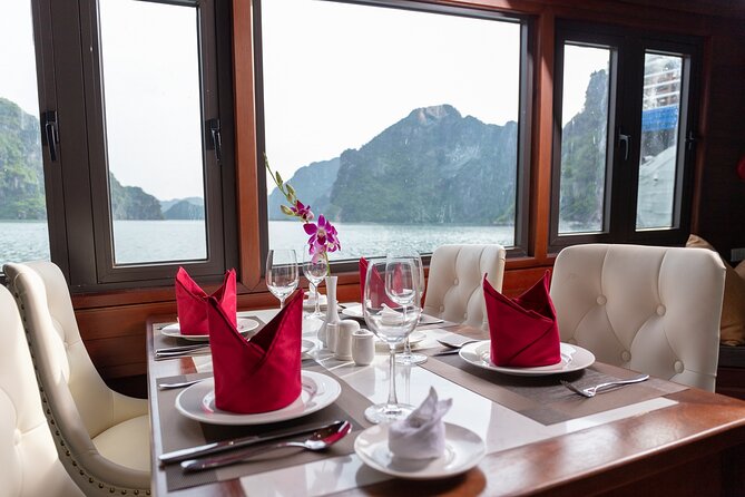 Unique Halong Private Day Cruise - Fishing Village, Kayak - Lunch, water, and the sunset tea break