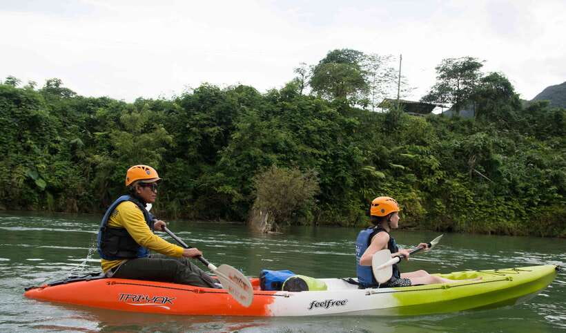 Vang Vieng: Kayaking & Cave Tubing with Zip Line/Blue Lagoon - A river start north of Vang Vieng