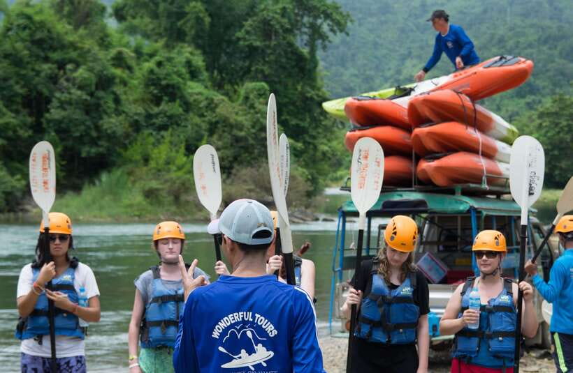 Vang Vieng: Tham Nangfar and Tham Nam Day Tour with Kayaking - Clothing, transport, and practical comfort